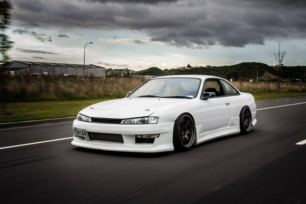 Nissan car on a country road