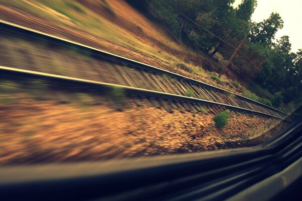 Railway, view from the window of a train on the move