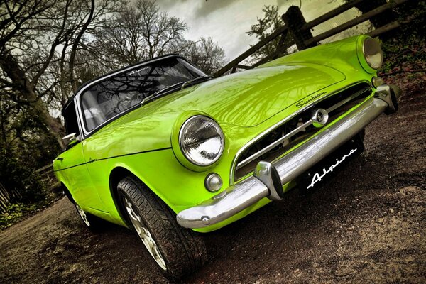 Retro car of bright green color