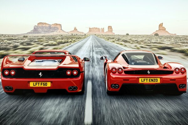 Two Ferari driving in the distance on the highway