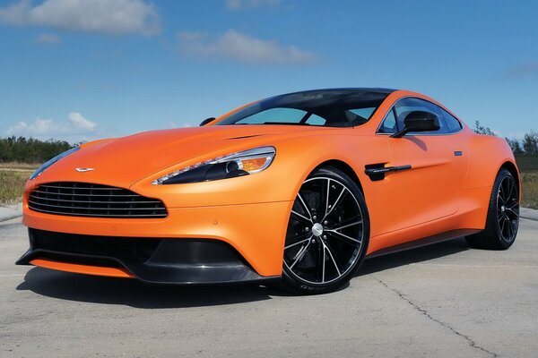 Aston Martin car on stylish wheels