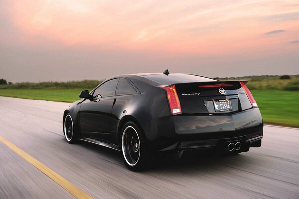 Sports car on the highway with the effect of speed