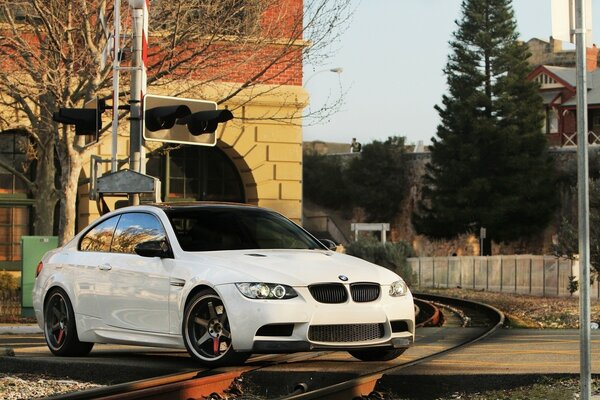 White BMW coupe with recessed discs