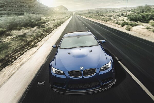 Blue BMW speeding at high speed