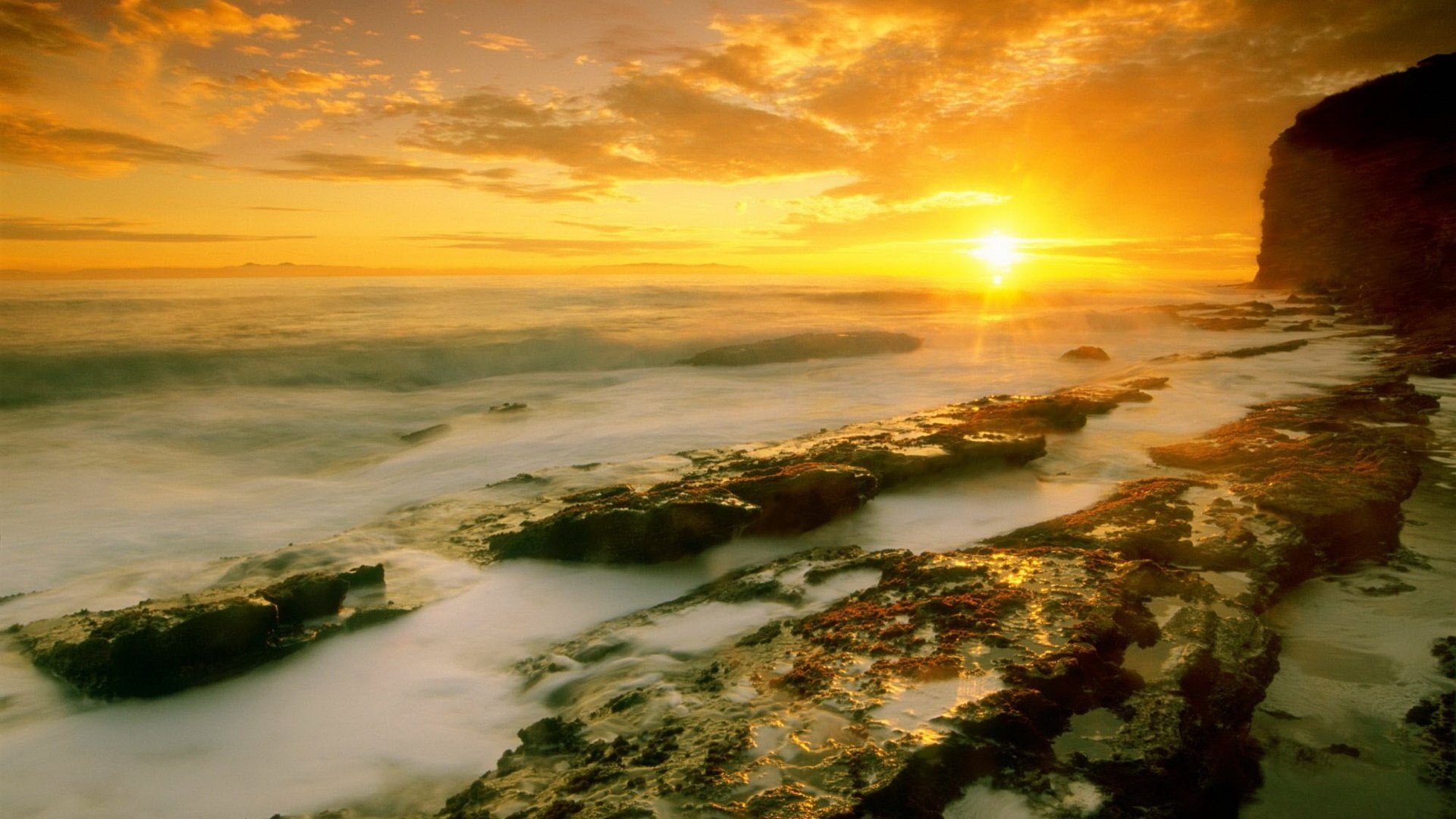 cielo dorato scivoli di pietra schiuma onde tramonto pietre sole orizzonte nuvole paesaggio natura mare surf