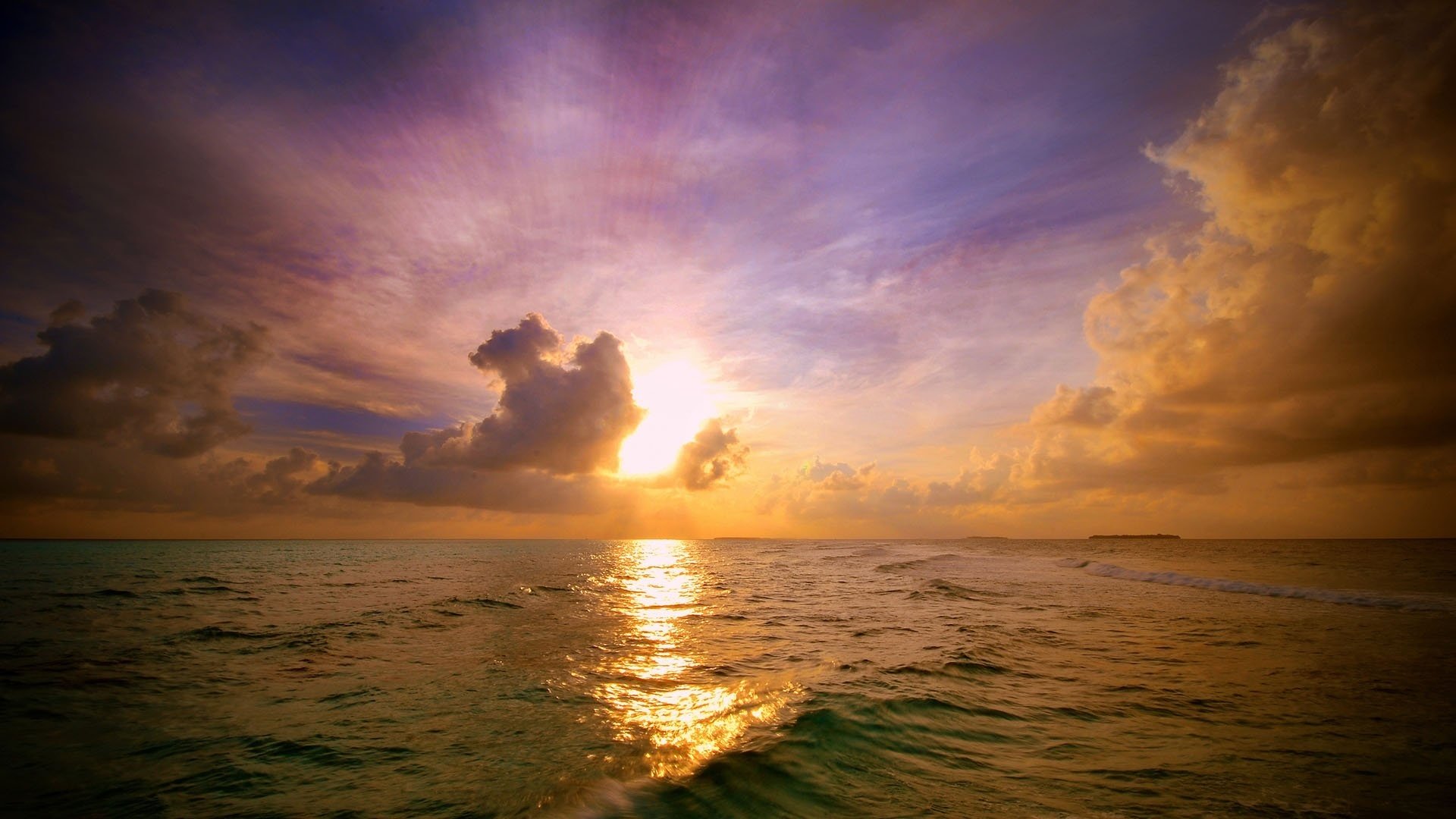 light waves on the water the sun lights sunset water the sky horizon sea wave view landscape