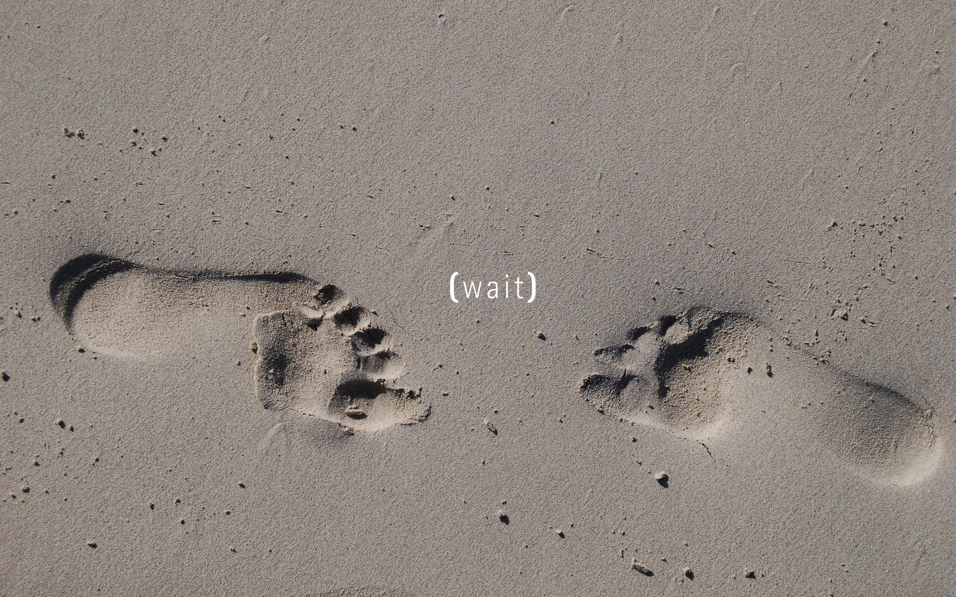 footprints wait sand