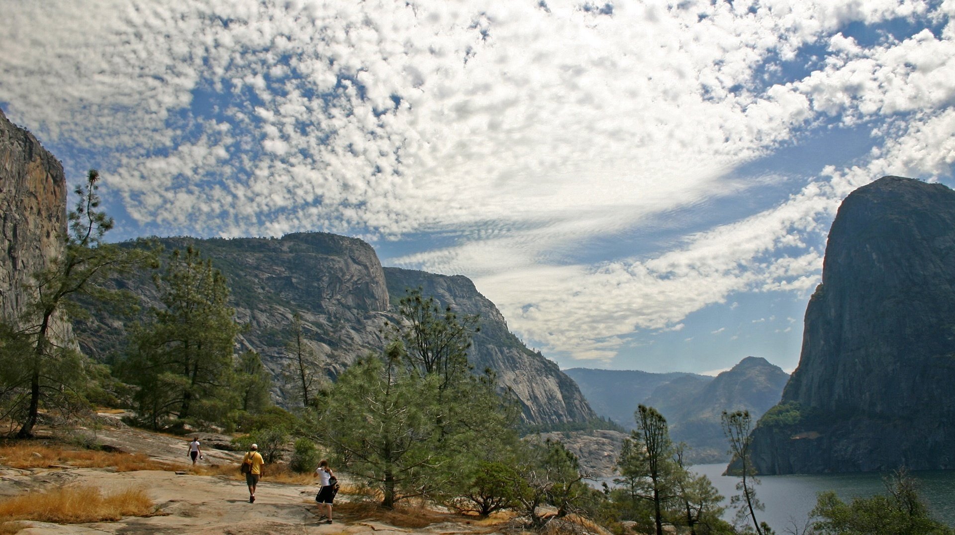 extraordinary sky the cliffs trees mountains the sky people tourists landscape