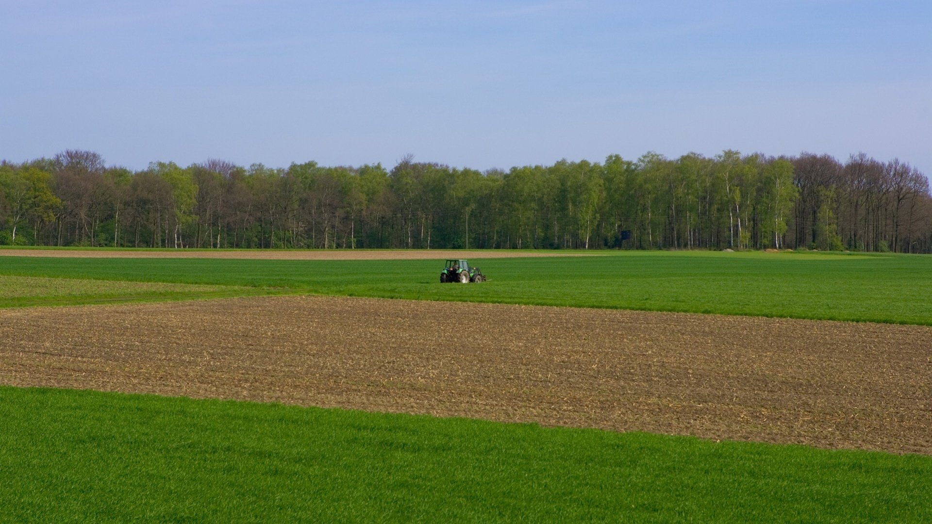 plowed plots field tractor