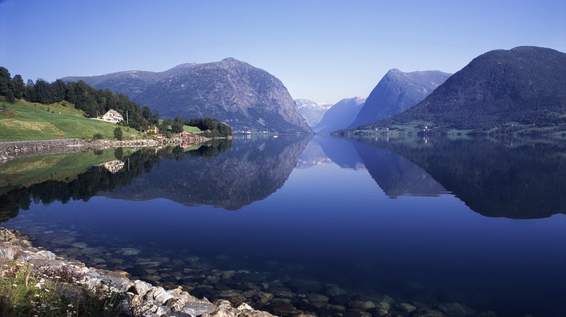 mall rocks mountain lake mirror mountains mountains water the bottom reflection surface landscape nature the sky blue water