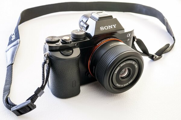 Black sony a7 camera on a white background