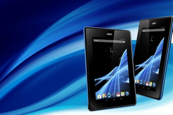 Two Acer tablets on a blue background