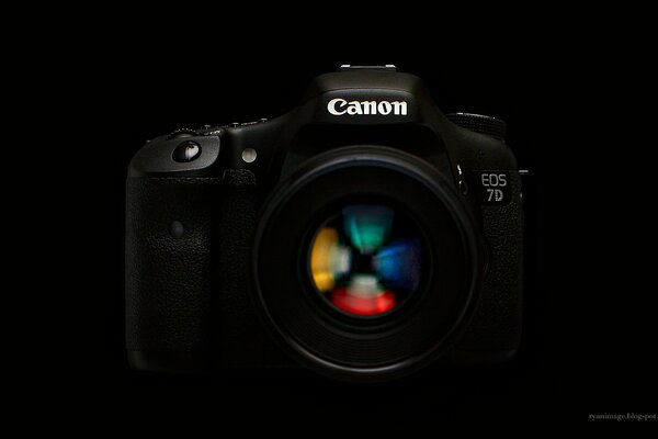 Canon SLR camera on a black background