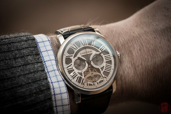 Mechanical watch on a man s hand