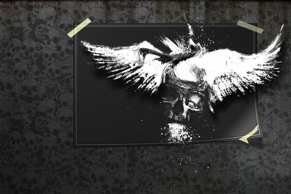 Black and white image of wings and skull