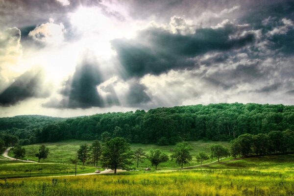 Bright glow behind the clouds in nature