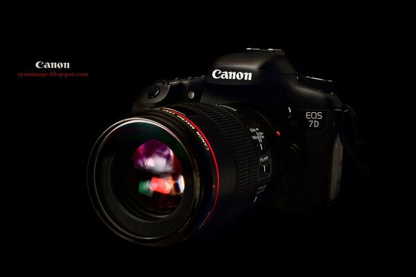 Very stylish canon eos 7d camera on a black background