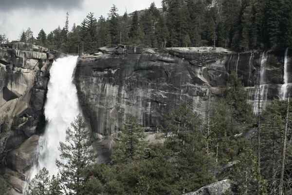 The beauty of nature waterfall rocks forest relief nature