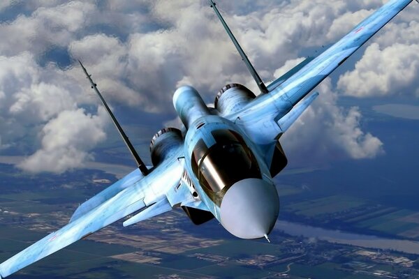 Blue Su-34 fighter in the sky