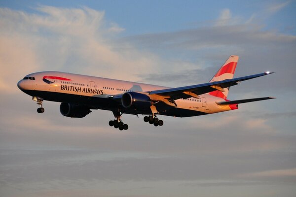 A passenger plane is flying in the sky