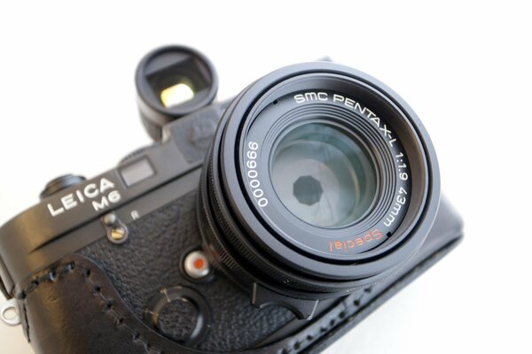 Macro photo of a camera on a white background