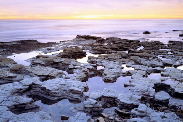 A deserted beach and cold and sad