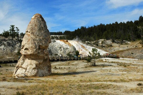 Stone sculpture stone forest people road