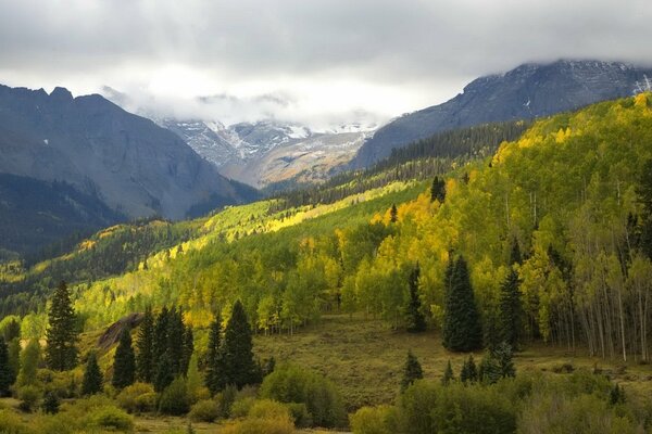 Thin rays of light over the mountains