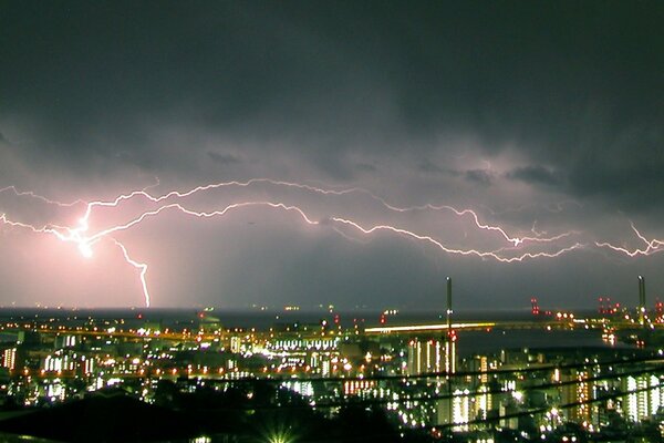 A thunderstorm at night in a modern metropolis