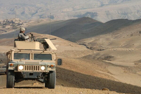 Hummer military vehicle in the sands