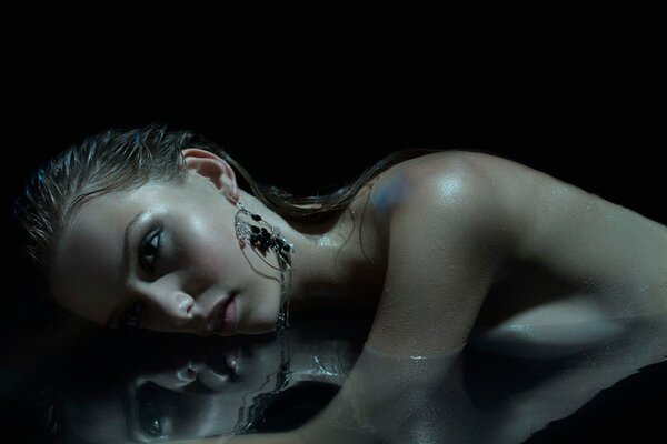 Professional photo of a girl in the water