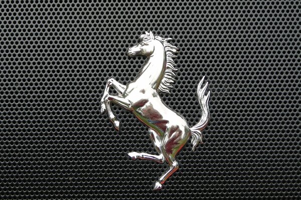 The emblem of the Ferrari car on the radiator