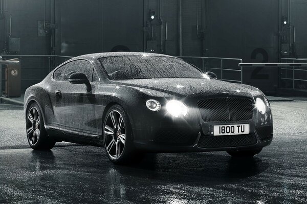 Black Bentley Coupe Supercar under the frost