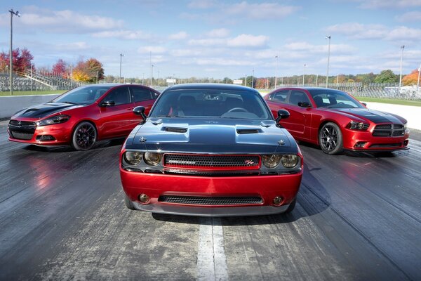 Red and black mopar on an icy track