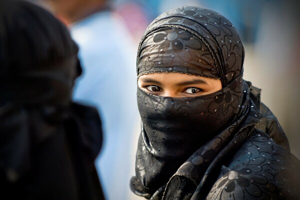 The eyes of an Oriental woman in a veil