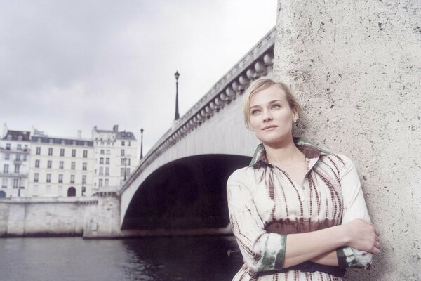 Girl on the background of the river