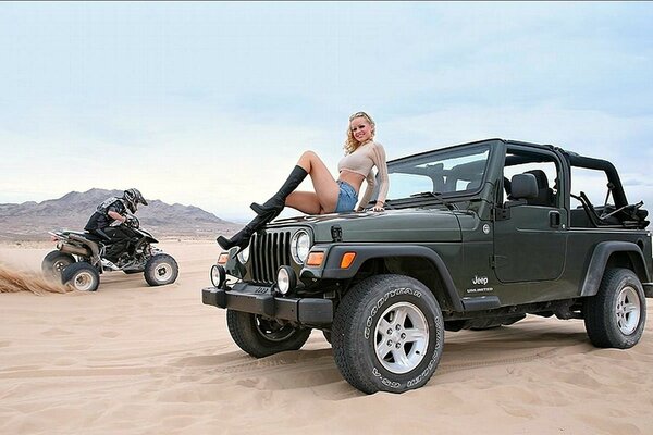 Motorcycle and car in the hot desert