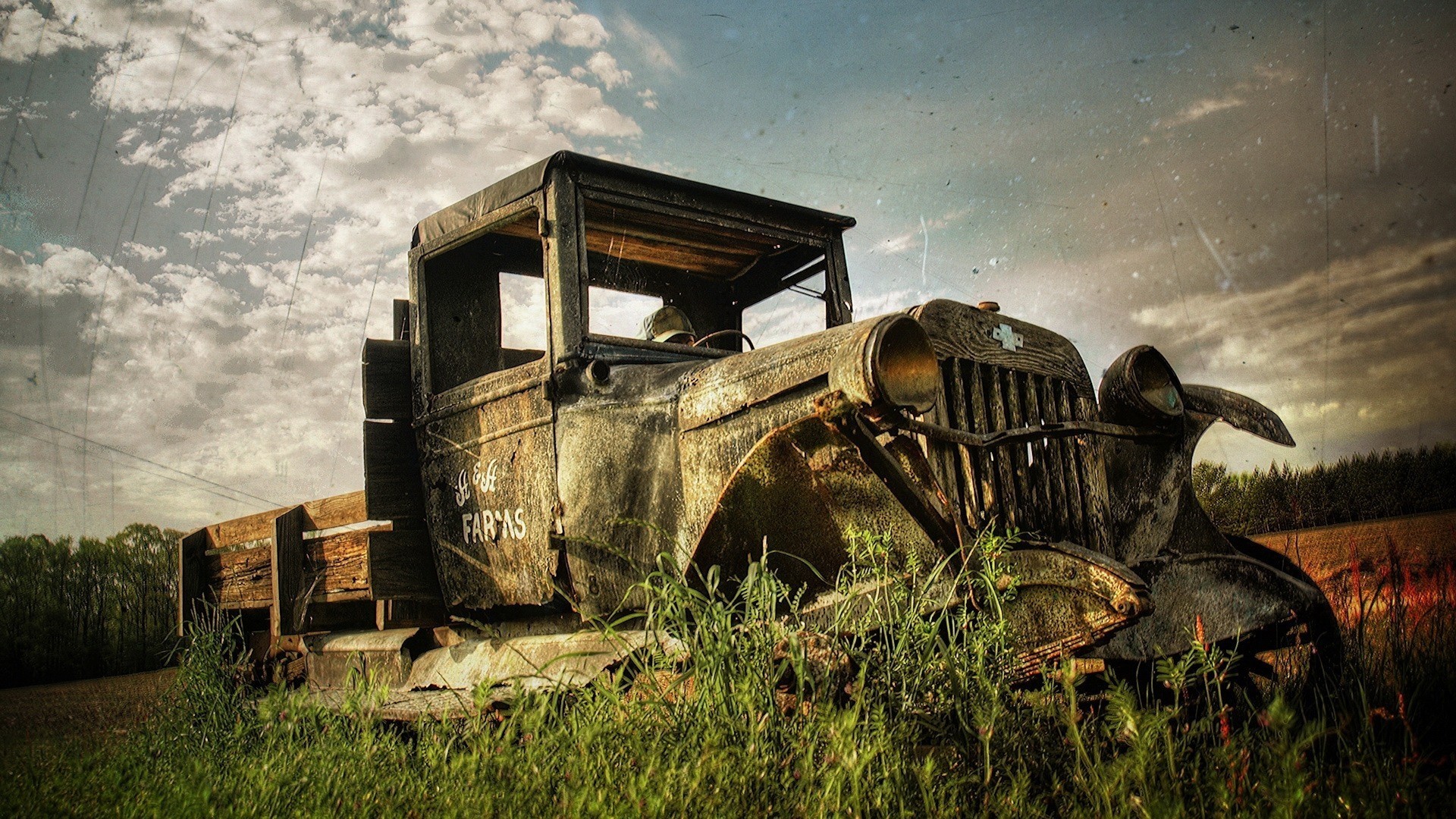 camion photo herbe champ épave ramassage