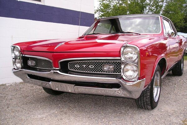 Old red gto on the street