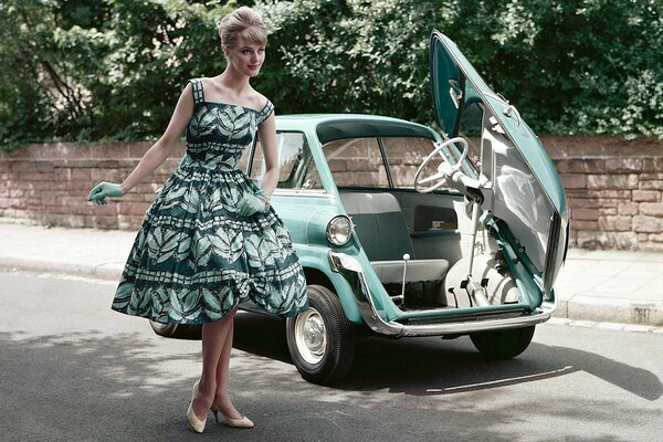 Retro car with blonde model