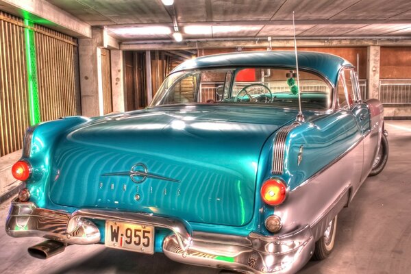 Vintage car gathering dust in the garage