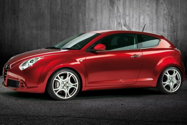 Red Alfa Romeo on a gray background