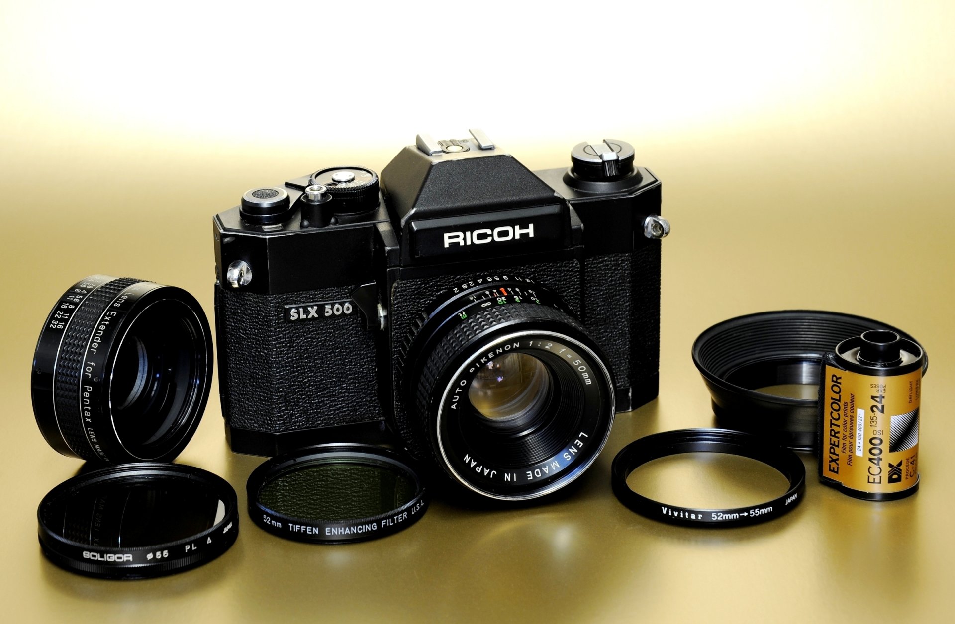 ricoh slx 500 slr mechanical film camera 1976 vertical lamella shutter metal shutters lens rikenon 50mm f / 2 rings photographic film background