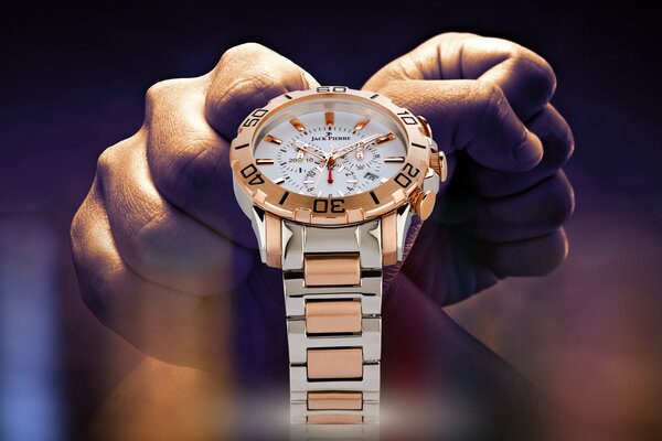 Men s wristwatch Jack Pierre on the background of hands