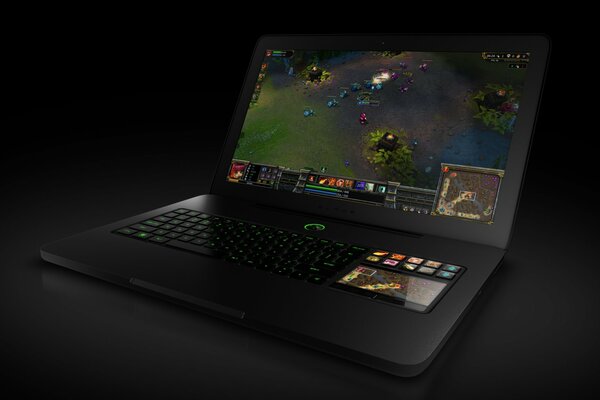 A laptop with a computer game on the screen