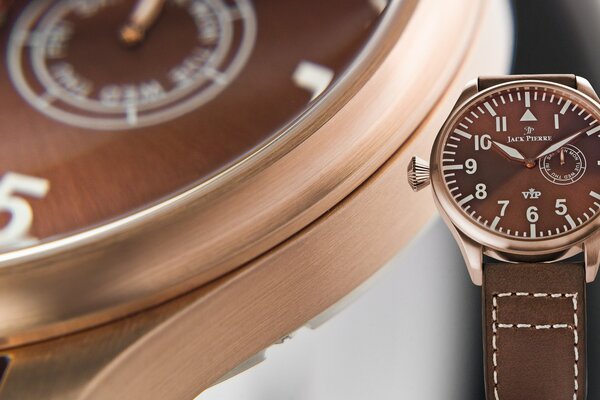 Jack Pierre s watch is brown and a close-up of them