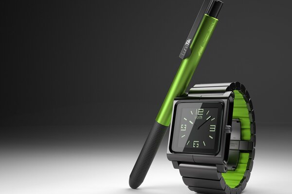 Horloge noire et stylo avec INSERT vert