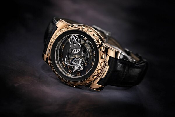 Mechanical watch in a gold frame