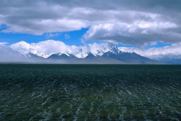 Reflection of clouds in water waves