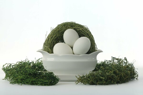 Composition of eggs and greens in a bowl